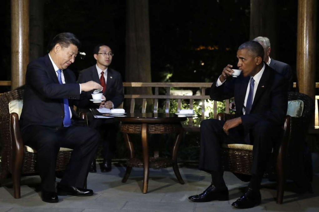 US President Barack Obama and President Xi Jinping drink tea together in a pavilion at West Lake State Guest House in Hangzhou on Saturday. Photo: AP