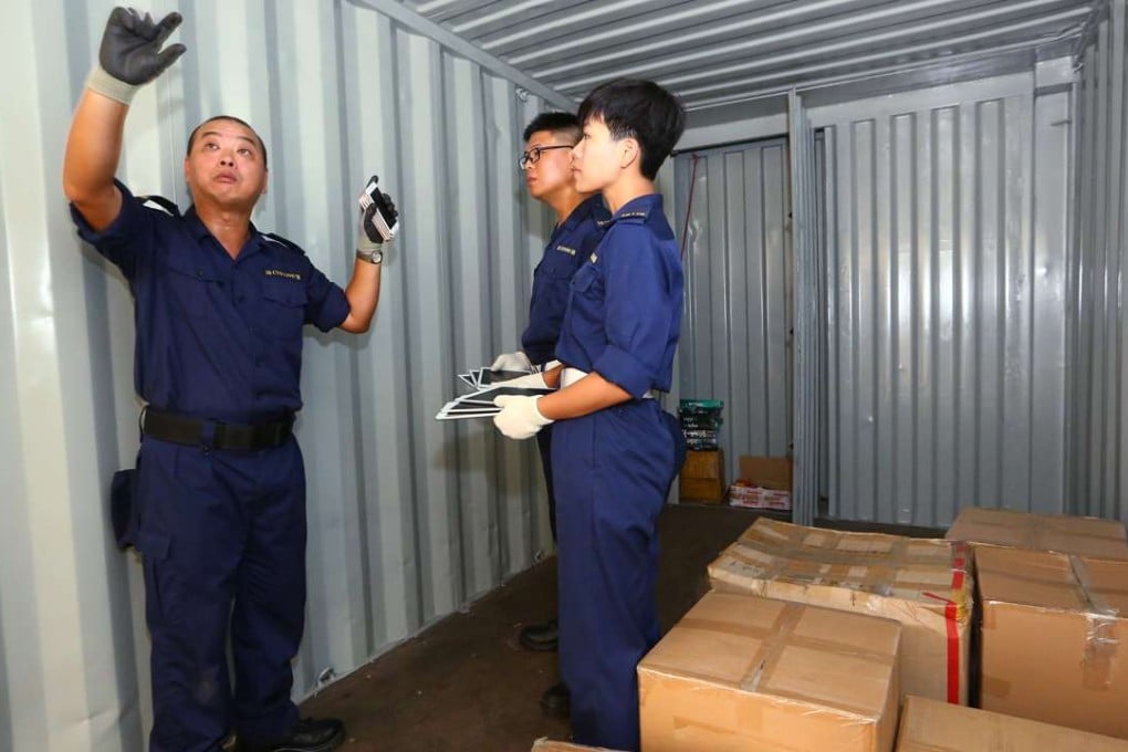 Customs officers are trained in how to detect smuggled goods. Photo: Edmond So