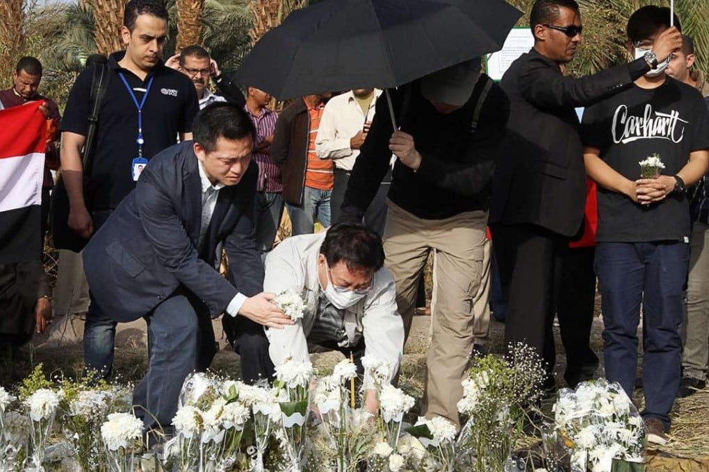Family members of the victims mourn at the crash site in Egypt. Photo: Sam Tsang