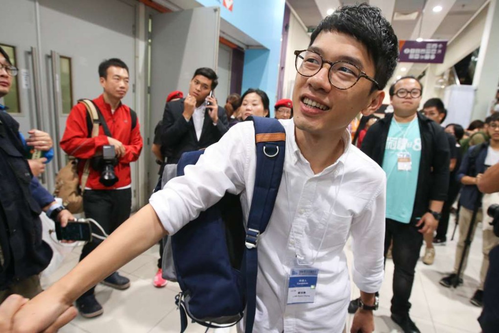 Nathan Law at the counting station at the AsiaWorld-Expo on Monday. Photo: Felix Wong