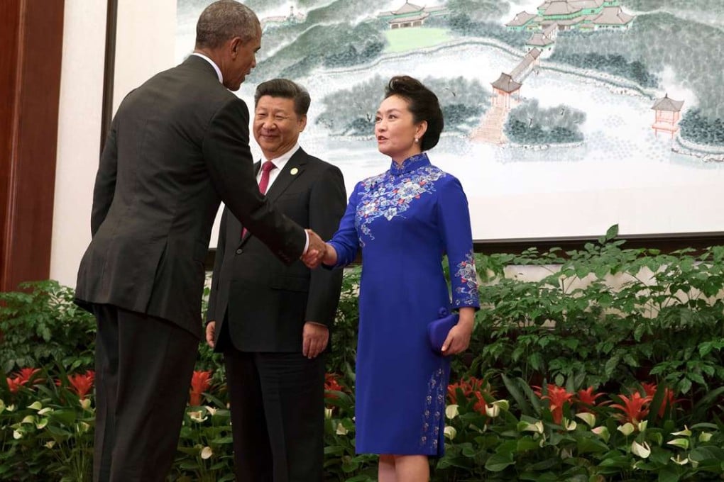 China's President Xi Jinping and his wife, Peng Liyuan, greet US President Barack Obama before the start of welcoming banquet at the G20 summit in Hangzhou on Sunday. Photo: Reuters