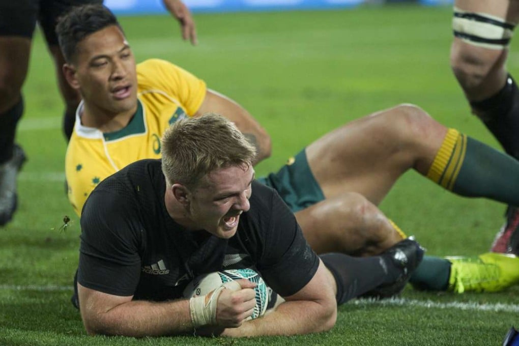 All Blacks flanker Sam Cane scores a try as New Zealand defeat an Australian side he says lacked focus. Photo: AP