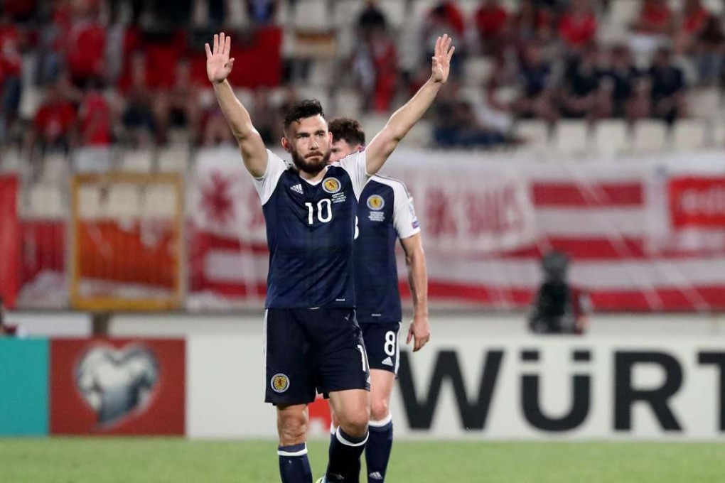 Hat-trick hero Robert Snodgrass of Scotland salutes the Scottish fans after scoring during the 2018 World Cup qualifier. Photo: EPA