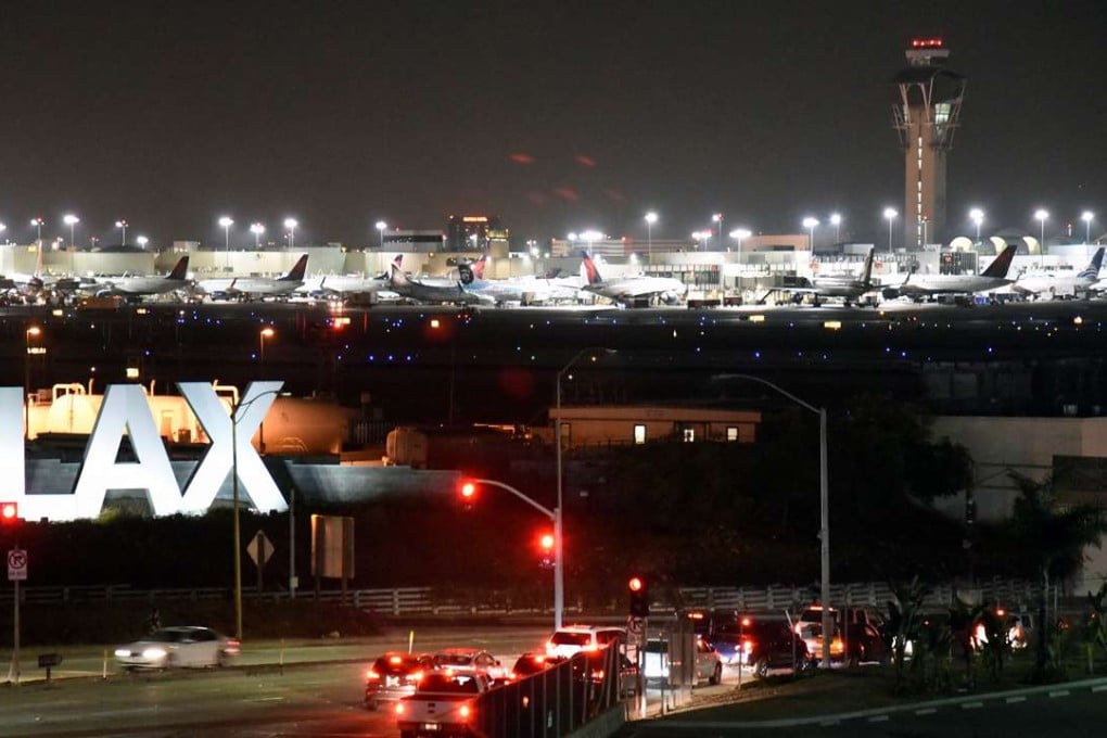 Traffic is seen near the LAX sign at Los Angeles International Airport in this file photo taken on August 28 amid a security scare. Photo: Reuters