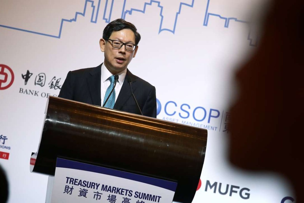 HKMA Chief Executive Norman Chan speaks at the Treasury Markets Summit 2016 at the Four Seasons Hotel in Central on Tuesday. Photo: Jonathan Wong