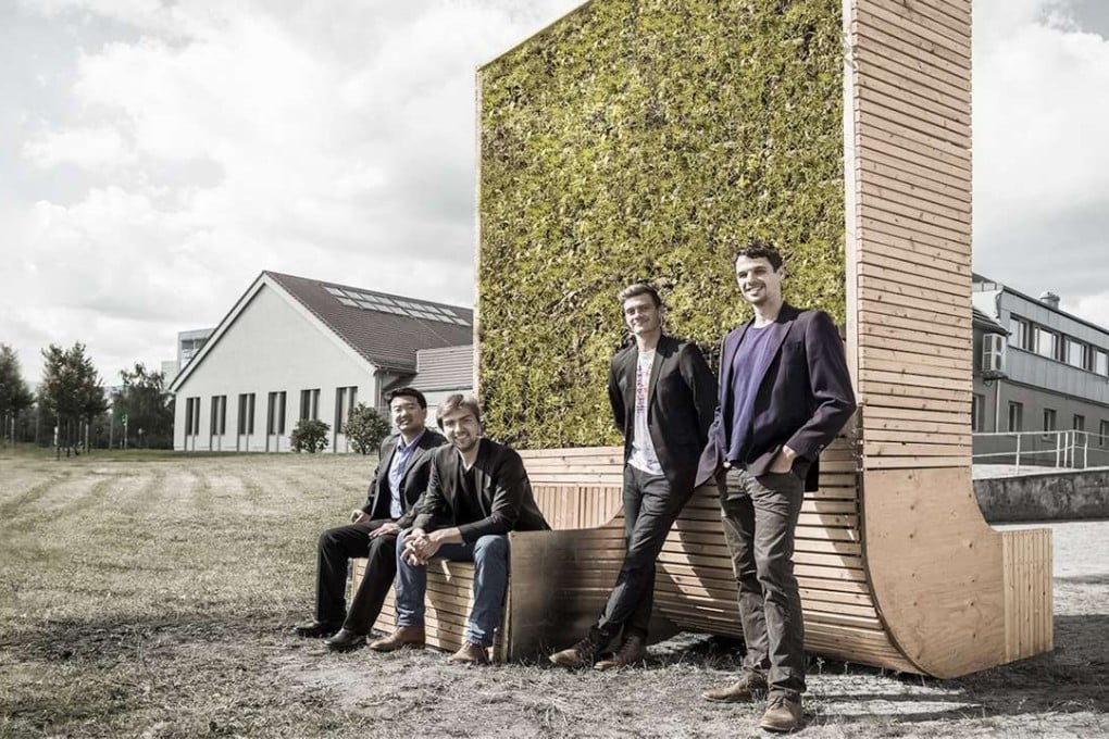 Green City Solutions’ co-founders (from left) Wu Liang, Dénes Honus, Peter Sänger and Victor Splittgerber with a CityTree prototype, in Dresden, Germany.