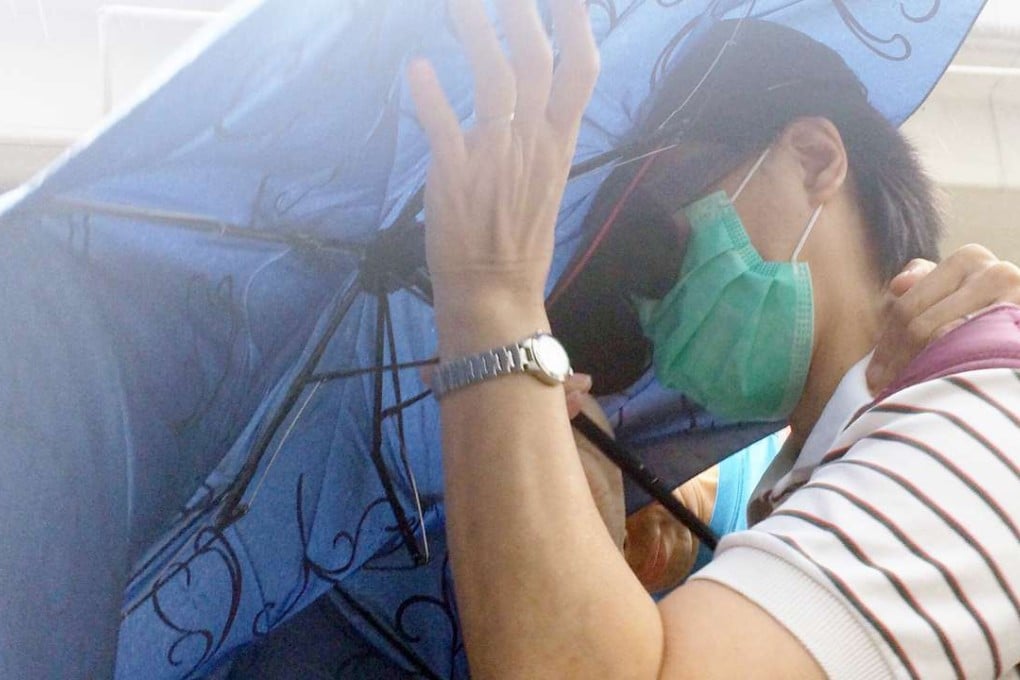 Janet Lau Wing-kam, 54, leaving Kwun Tong Court on Tuesday. Photo: SCMP Pictures