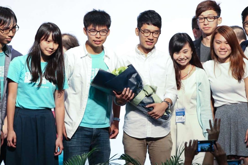 Nathan Law Kwun-chung(L4) celebrates. Photo: Dickson Lee