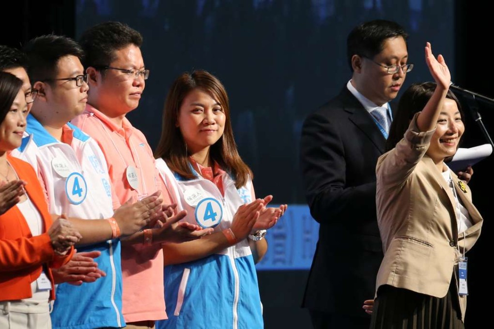 Democracy Groundwork’s Lau Siu-lai (waving) was a big winner in Kowloon West. Photo: Sam Tsang