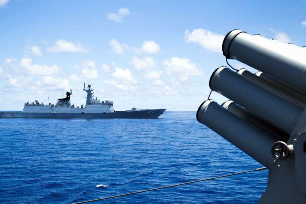 The Chinese navy carries out a logistics supply drill near the James Shoal area, also claimed by Malaysia, in the South China Sea. Photo: AFP