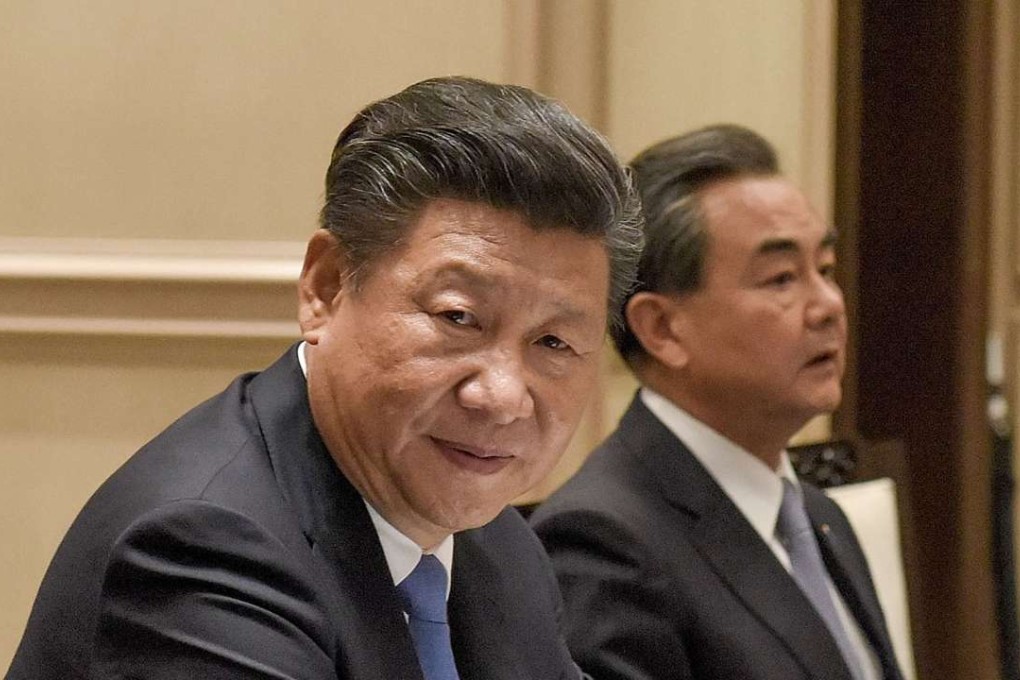 Chinese President Xi Jinping, alongside Foreign Minister Wang Yi, while attending a meeting with Japanese officials in Hangzhou, China, on September 5, 2016. Photo: Kyodo