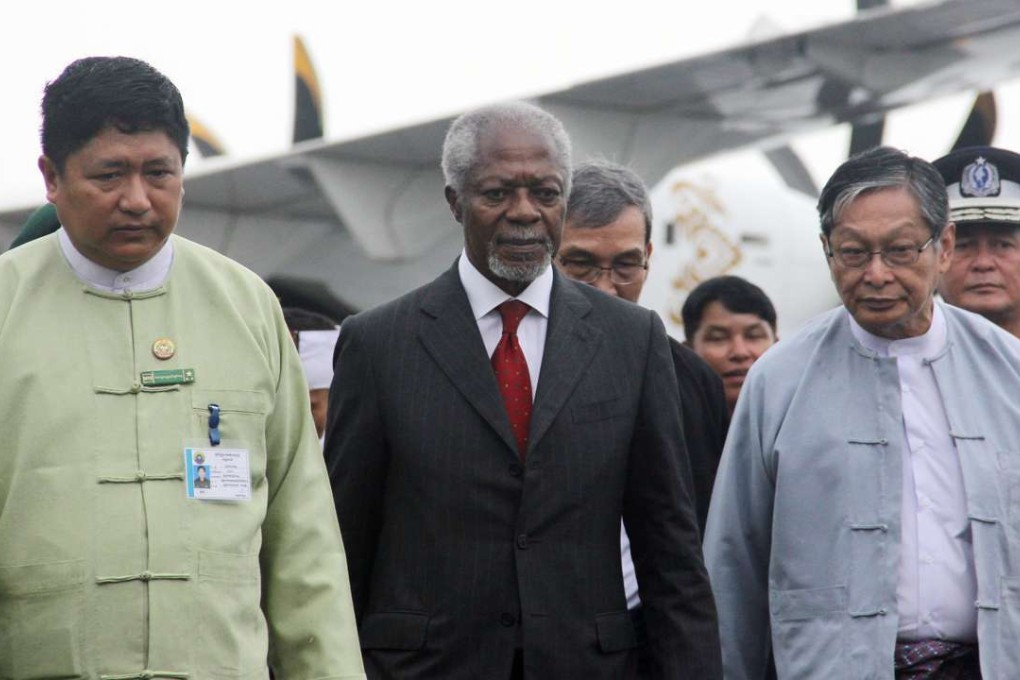 Former United Nations Secretary General Kofi Annan (centre), who chairs the recently created Rakhine State Advisory Commission, is escorted by local authorities as he arrives at the airport in Sittwe, Rakhine state, Myanmar. Photo: AP