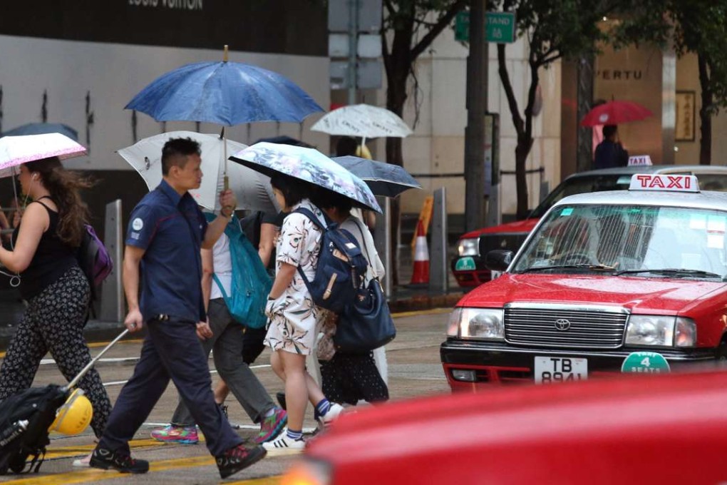 The government introduced Hong Kong’s famous red and silver taxi liveries in 1974. Photo: K. Y. Cheng