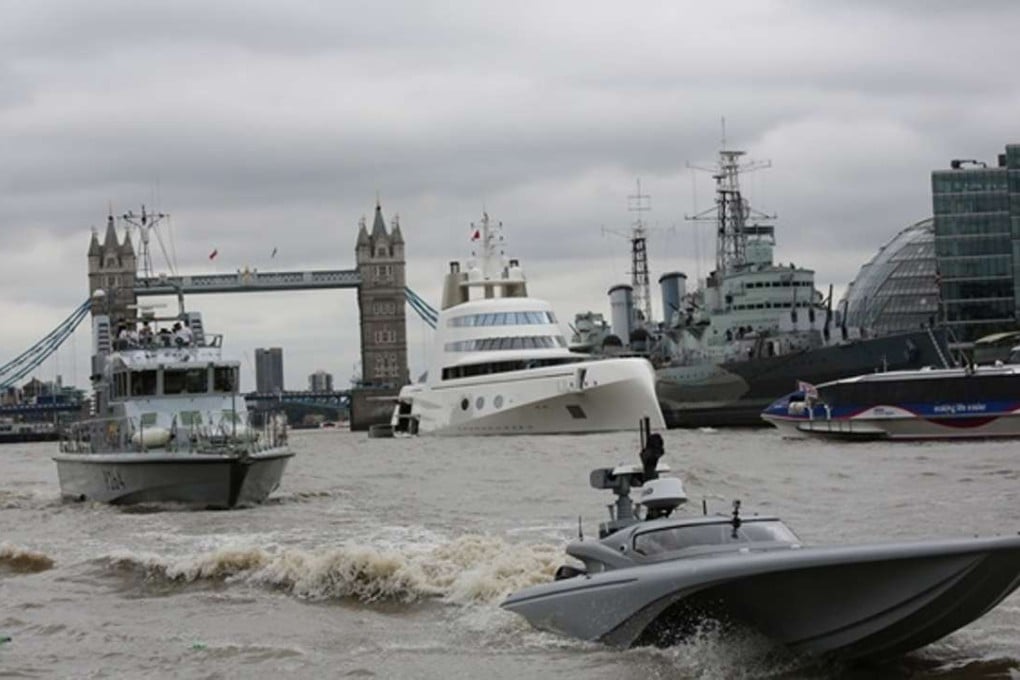 The UK’s Maritime Autonomy Surface Testbed (MAST), an unmanned speedboat, undergoes trials in the Thames near Tower Bridge on MOnday. Photo: Royal Navy