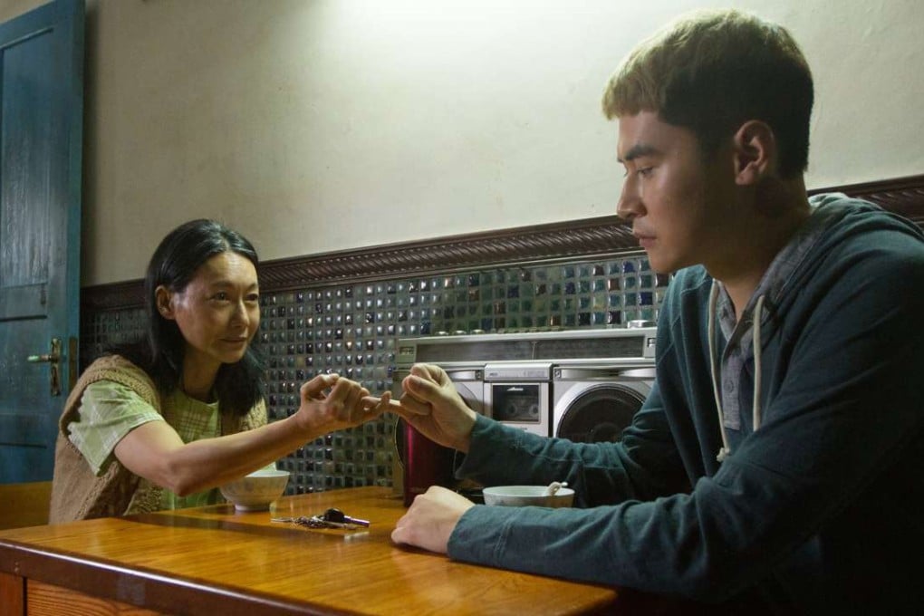 Kara Wai and Carlos Chan in Happiness (category IIB; Cantonese), directed by Andy Lo.