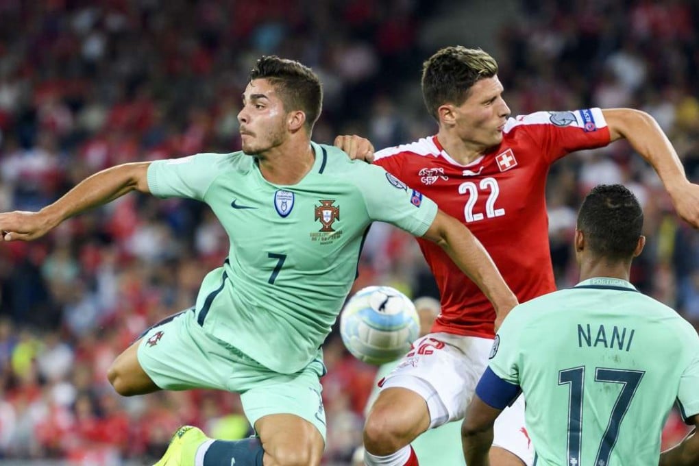 Portugal's Andre Silva and Switzerland defender Fabian Schaer vie for the ball in Basel. Photo: AFP