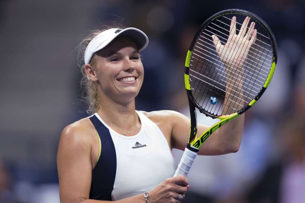 Caroline Wozniacki celebrates her victory over Anastasija Sevastova. Photo: AFP