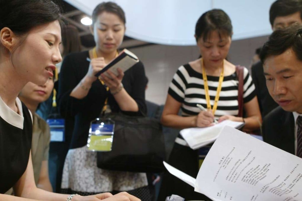 A student being interviewed for a position at a recruitment fair. The dynamic has changed so that employers often woo candidates in their search for the best talent. Photo: K. Y. Cheng