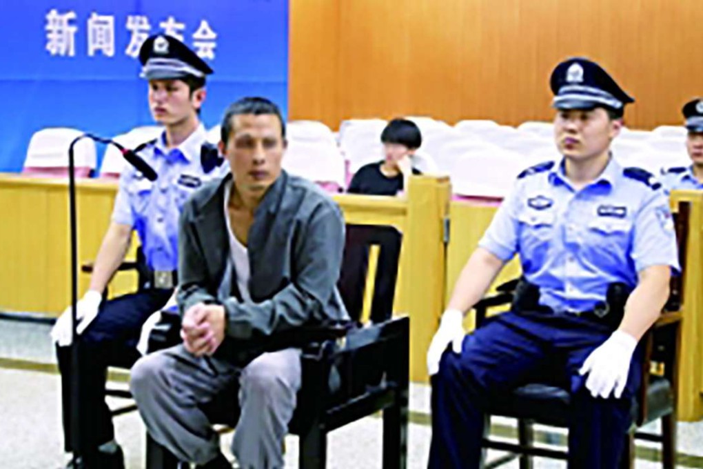 The burglar pictured in court. Photo: Sina.com.cn
