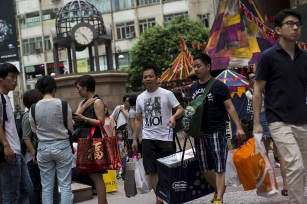 A file picture of tourists shopping in Causeway Bay in Hong Kong last year. Photo: Reuters