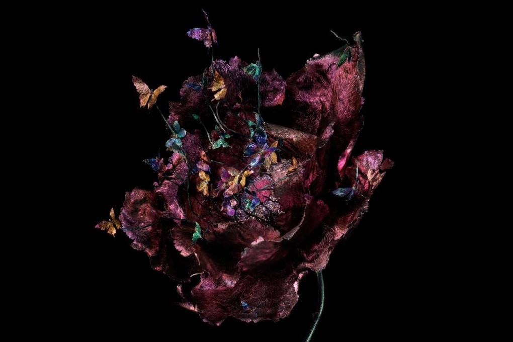 Named ‘Rise of Heart’, the piece features hundreds of rubies, citrines, amethysts and yellow diamonds and is inspired by motifs in Chinese poetry – the peony and butterflies