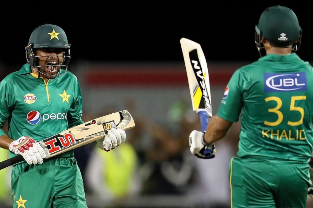 Pakistan's Babar Azam celebrates hitting the winning runs against England. Photo: AP