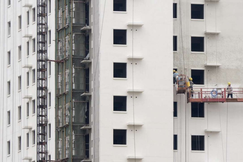 An apartment block being built in Beijing, one of China’s hottest property markets. Photo: EPA