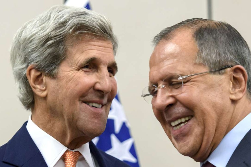 US Secretary of State John Kerry, left, and Russian Foreign Minister Sergey Lavrov smile after meeting in Geneva, Switzerland, on August 26. They were due to attend fresh talks on Friday in the same city. Photo: AP