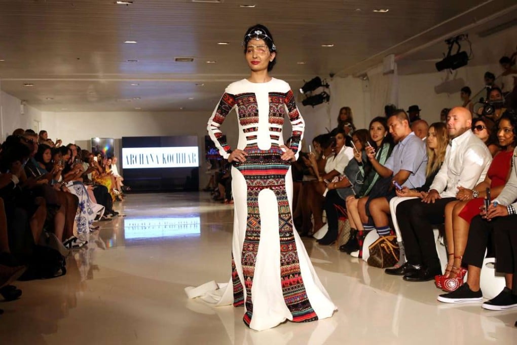 Acid attack survivor Reshma Qureshi walks the runway during New York Fashion Week. Photo: AFP