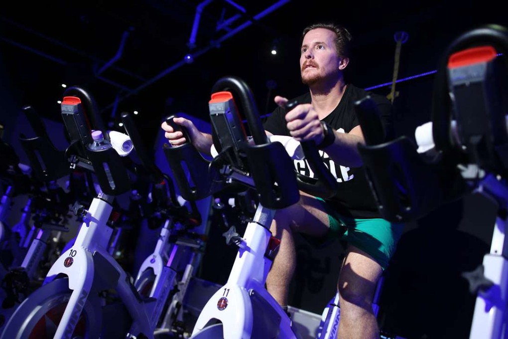 Elliott Shadforth burning calories at Torq indoor cycling studio in Central. Photos: Dickson Lee