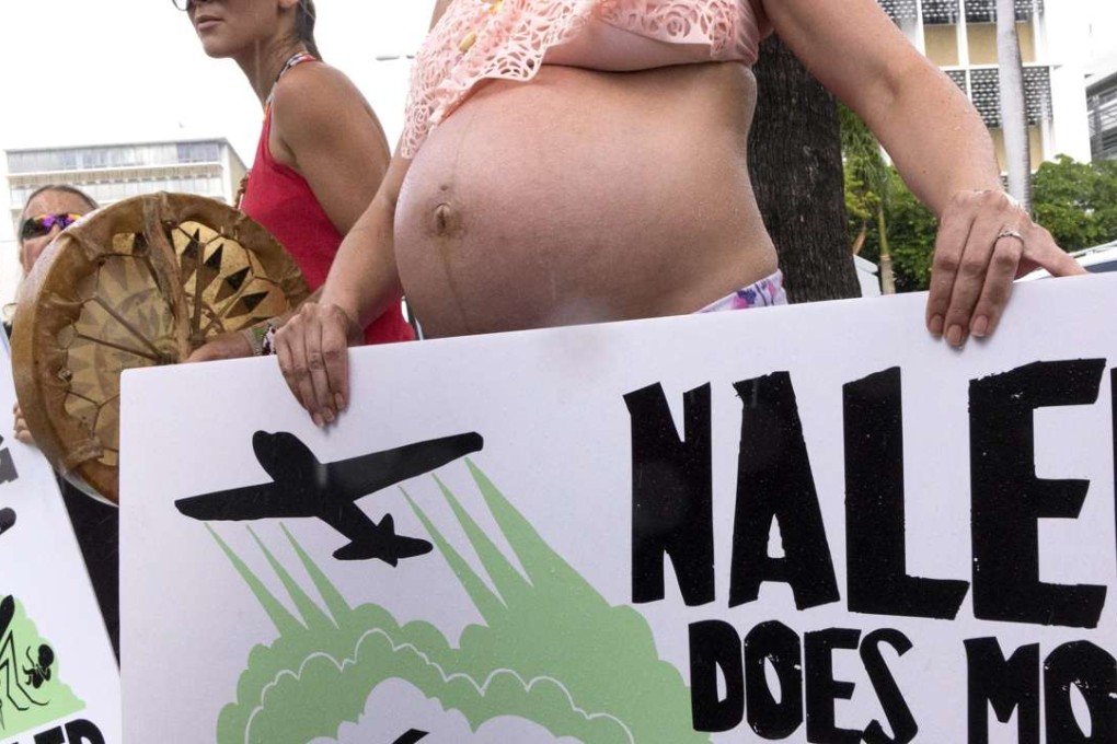 Miami Beach's residents demonstrate against the aerial spraying with Naled insecticide in front of the Miami Beach City Hall in Miami Beach, Florida. Authorities are taking steps to prevent an outbreak of Zika in the city after Miami Beach was confirmed as a new zone of virus transmission. Photo: EPA