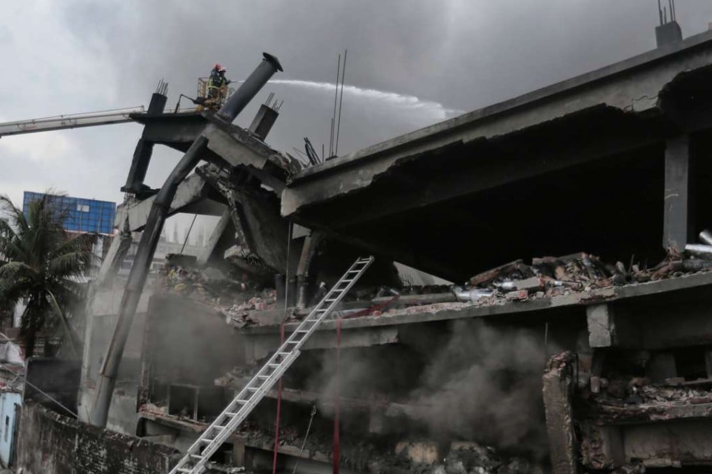 Firefighters work to put out a fire at Tampaco Foils factory in Tongi. Photo: AP