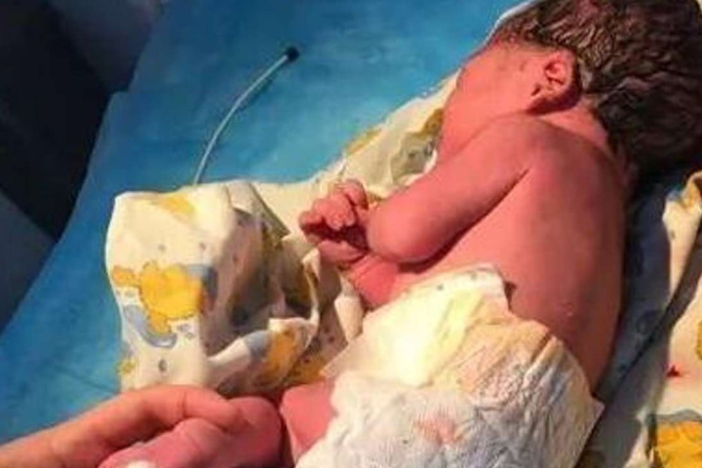 The newborn Chinese baby is fit and healthy after he was abandoned by his mother, who claimed she thought he was stillborn. Photo: SCMP Pictures