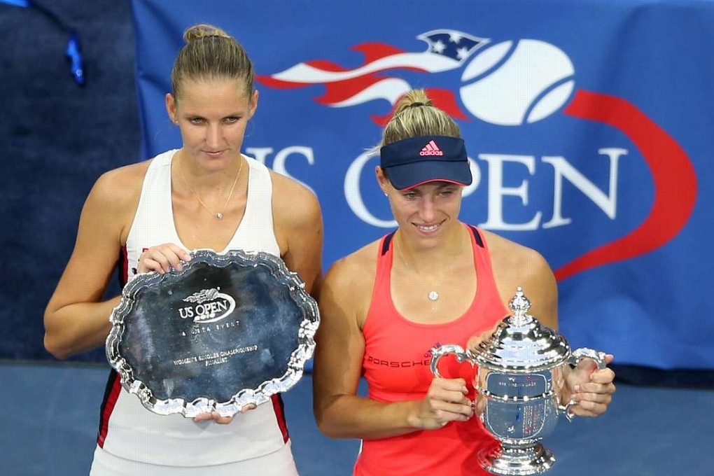 Angelique Kerber of Germany and Karolina Pliskova of Czech Republic pose with their trophies during the award ceremony after the US Open final. Photo: Xinhua