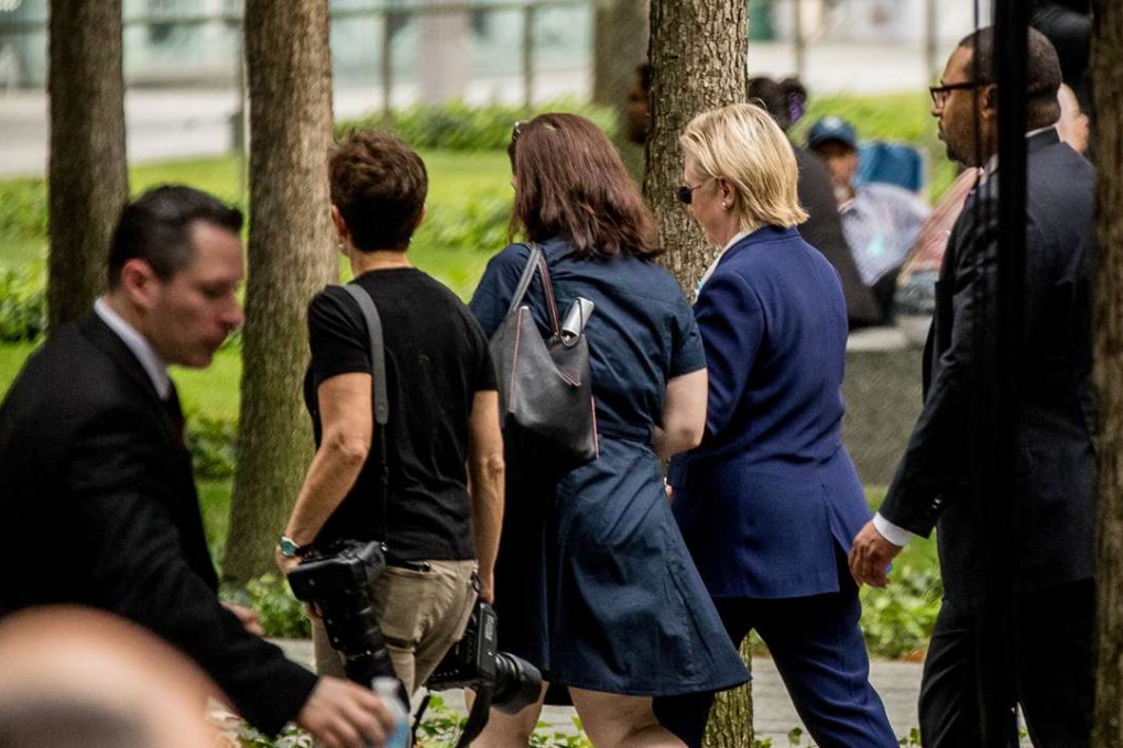 Democratic presidential candidate Hillary Clinton, second from right, departs a September 11 memorial, in New York. Minutes later, her legs almost gave out from under her, in a scene captured on video. Photo: AP