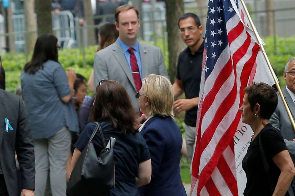US Democratic presidential candidate Hillary Clinton leaves ceremonies marking the 15th anniversary of the September 11 attacks in New York. Moment later, her legs buckled underneath her in an incident caught on video. Photo: Reuters
