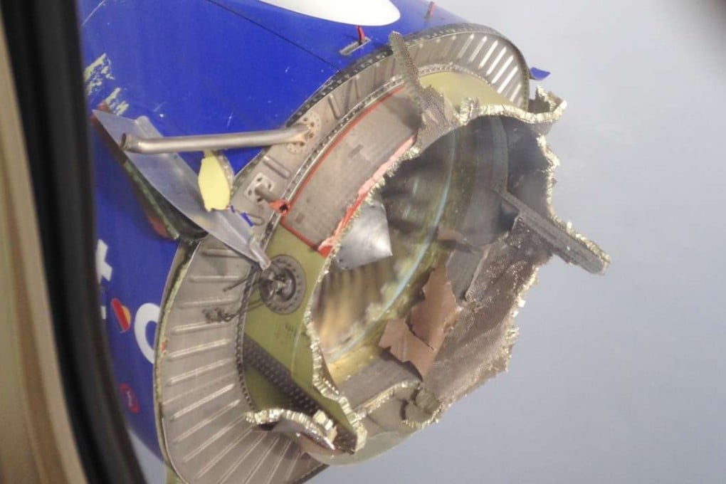 This August 27 photo shot mid-air shows an engine through a window of a Southwest Airlines flight, after the engine disintegrated during a flight from New Orleans to Orlando, Florida. Photo: AP