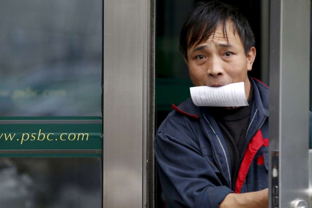 The Postal Savings Bank of China, which operates 40,000 branches on the mainland, is the country’s seventh-largest lender. Photo: Reuters