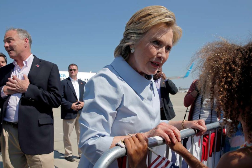US Democratic presidential nominee Hillary Clinton and vice-presidential candidate and US Senator Tim Kaine greet well-wishers in Cleveland, Ohio, on September 5. Photo: Reuters