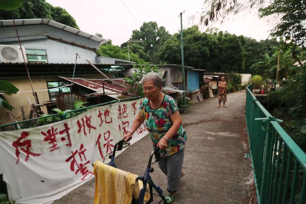 Ng Kwai-ngor, 80, who has lived in Wang Chau for about 70 years, may be forced to move. Photo: Edward Wong