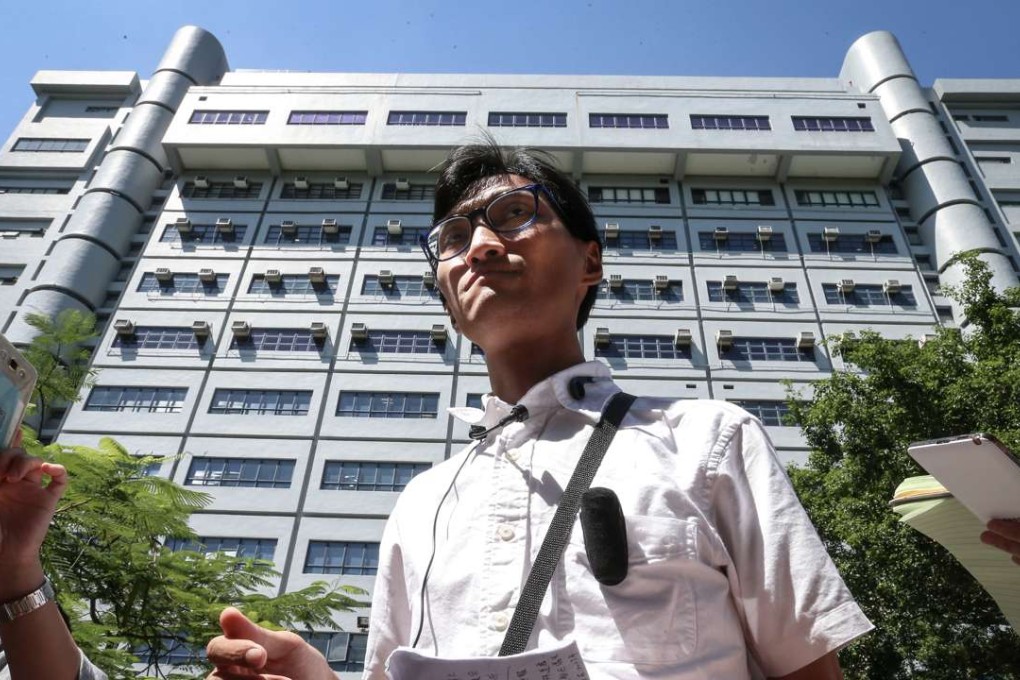 Eddie Chu Hoi-dick, pictured outside the New Territories North Regional Police Headquarters in Tai Po is under round-the-clock police protection. Photo: K. Y. Cheng