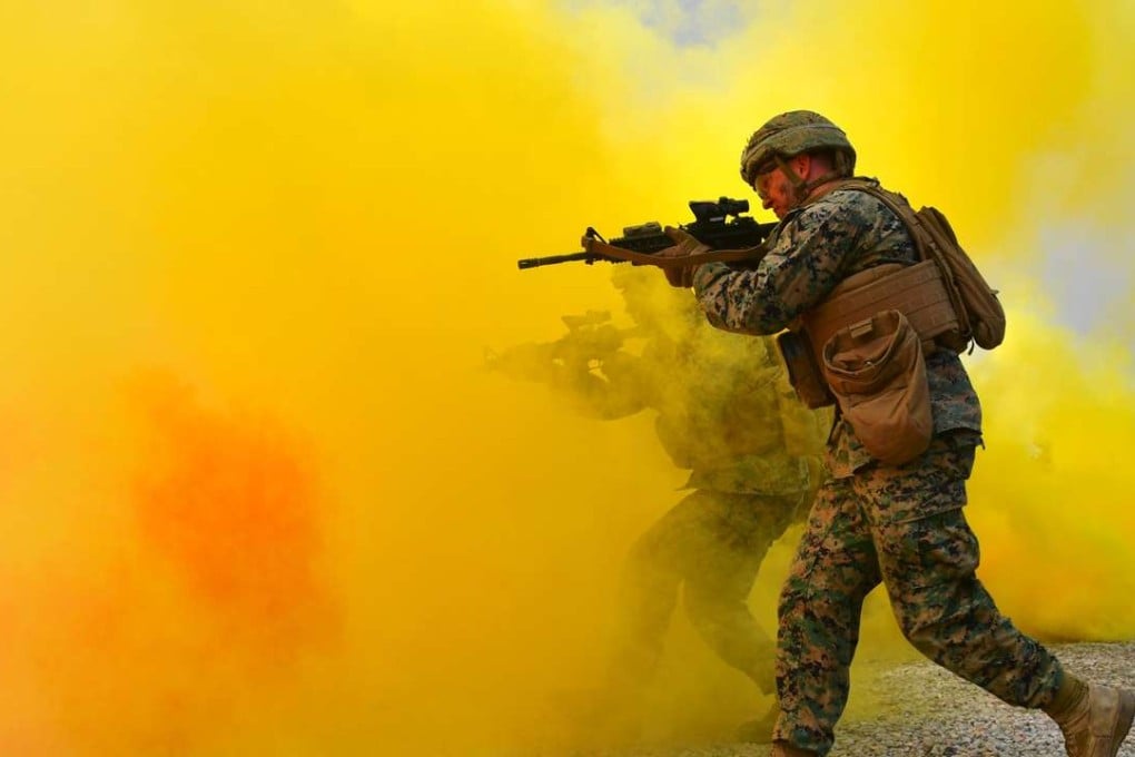 US marines move to a position during a re-enactment of Operation Chromite, the battle that turned the tide in the Korean War, in the western port city of Incheon on September 9, 2016. Photo: AFP