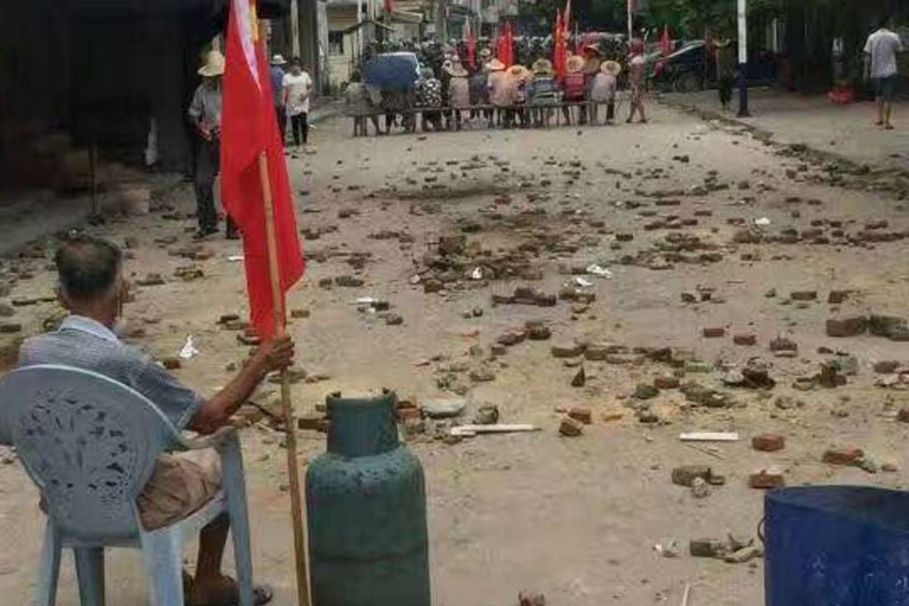 Wukan villagers in a stand-off with police in a photo supplied by villagers. Photo: SCMP Pictures