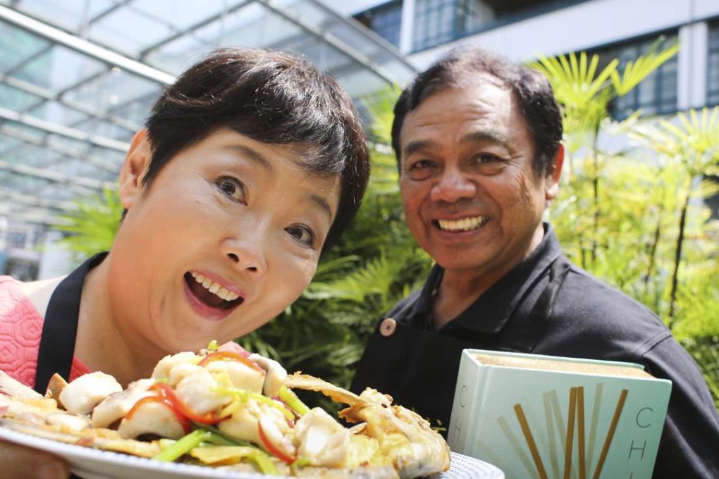 Cookbook authors Chan Kei-lum and Diora Fong with one of their dishes: pomfret with crispy bones. Photo: May Tse
