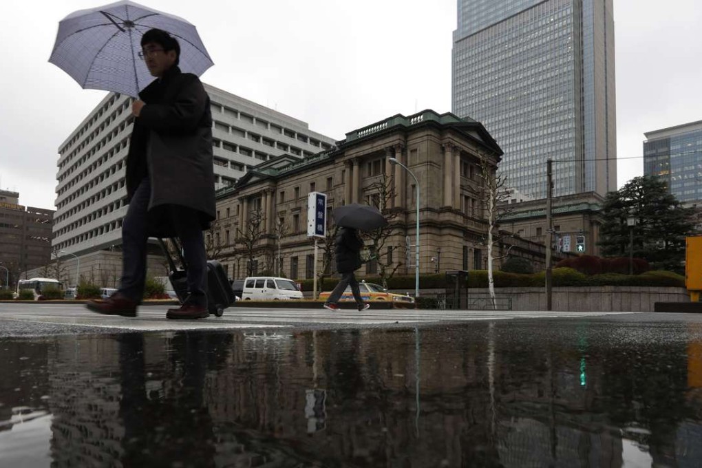 The Bank of Japan (BOJ) headquarters in Tokyo. Negative interest-rate strategies by central banks have contributed to historical highs in global stock markets. Photo: Bloomberg