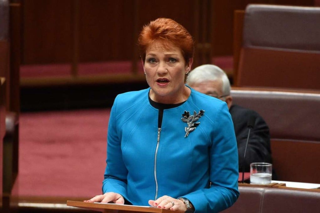 Australia's One Nation party leader Senator Pauline Hanson makes her maiden speech in the Senate at Parliament House in Canberra. Photo: Reuters