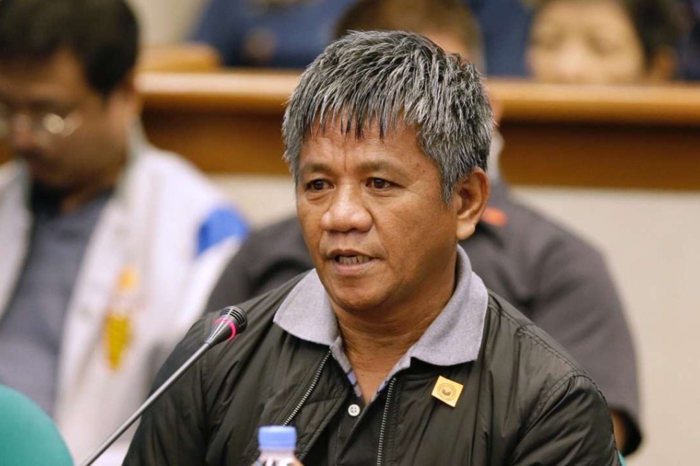 Former militiaman Edgar Matobato testifies before the Philippine Senate in Pasay, south of Manila. Photo: AP