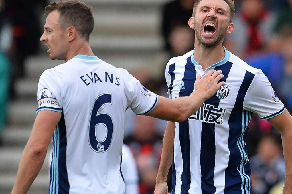 West Bromwich Albion's Northern Irish defender Gareth McAuley shouts at an official during the English Premier League football match between Bournemouth and West Bromwich Albion at the Vitality Stadium in Bournemouth, southern England. A Chinese group completed its takeover of West Brom. Photo: AFP