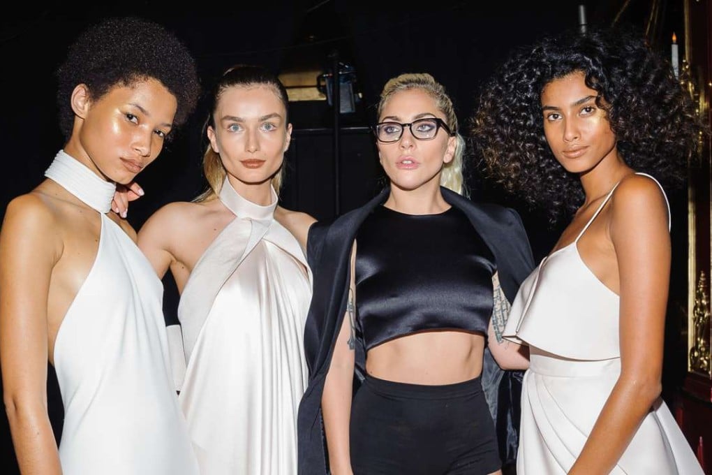 Lady Gaga, second from right, poses with models at the Maxwell Spring/Summer 2017 collection. Photo: AP