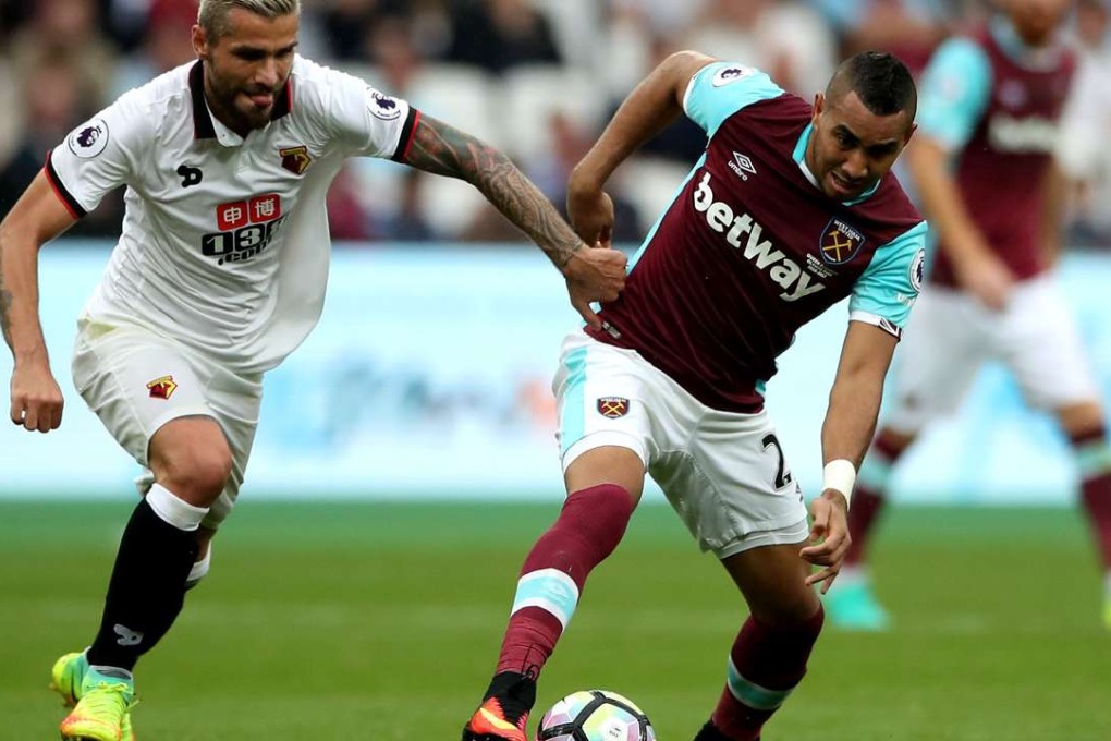 West Ham Dimitri Payet challenges with Watford’s Valon Behrami for the ball during their English Premier League meeting. Photo: AP